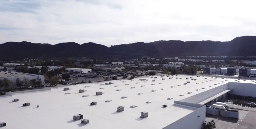 Large warehouse in Temecula, CA coated with high solids silicone by Level 1 Roofing