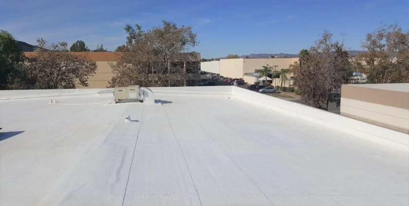 Commercial Roofing Restoration in Temecula, CA – Silicone Coating on Warehouse