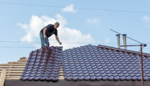 A professional offering roof repair services